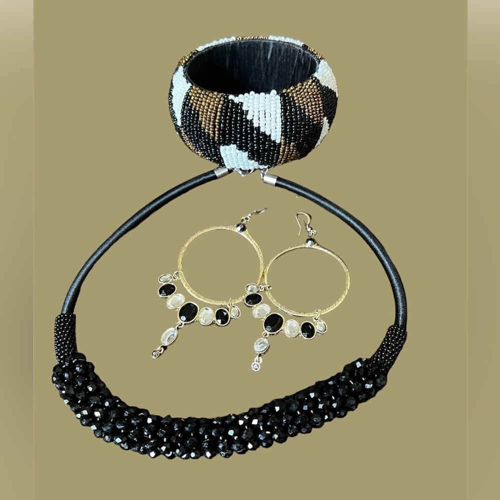 Necklace, earrings, and bracelet, black white and gold very nice